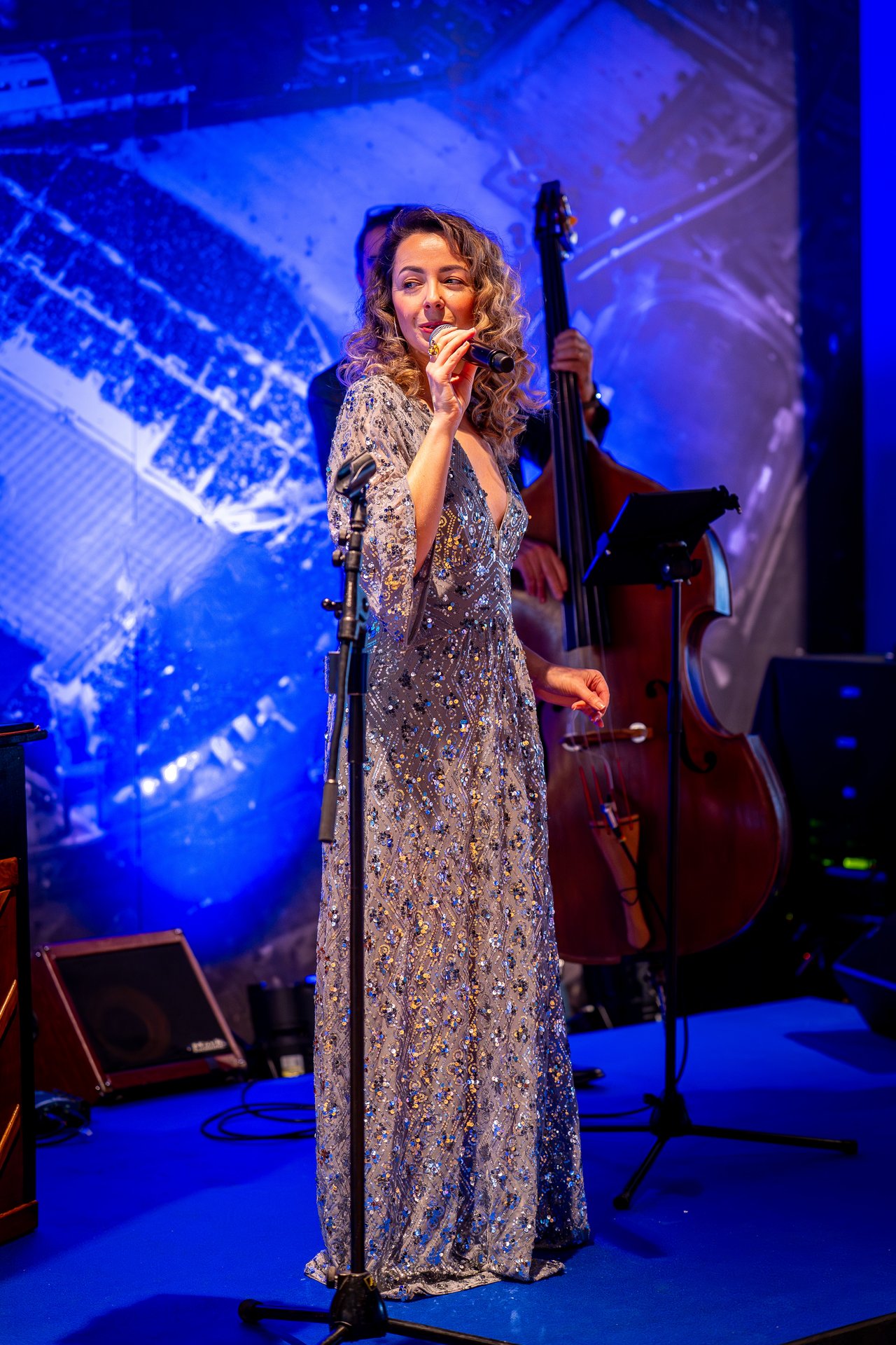 Velvet Rose singer and double bass performing live at an international event