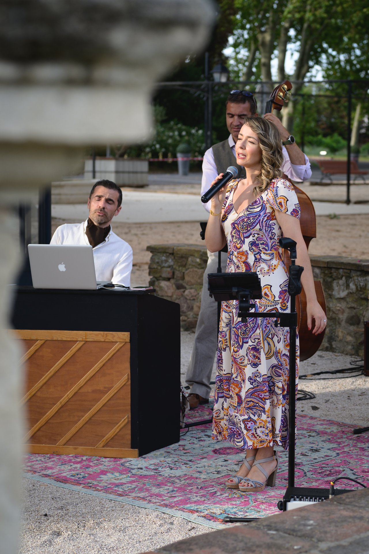 Velvet Rose trio performing in a private garden